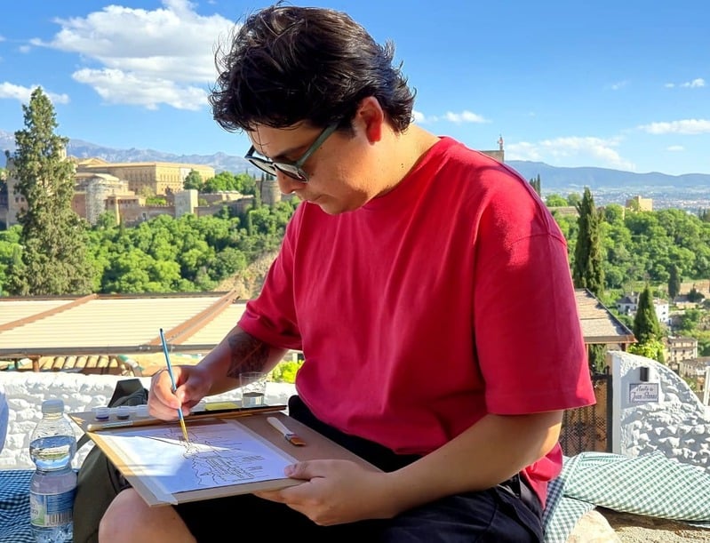 Persona pintando al aire libre